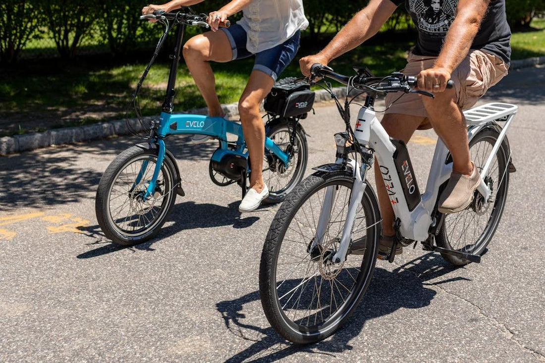 Waist-level shot of two riders on Lectric e-Bikes