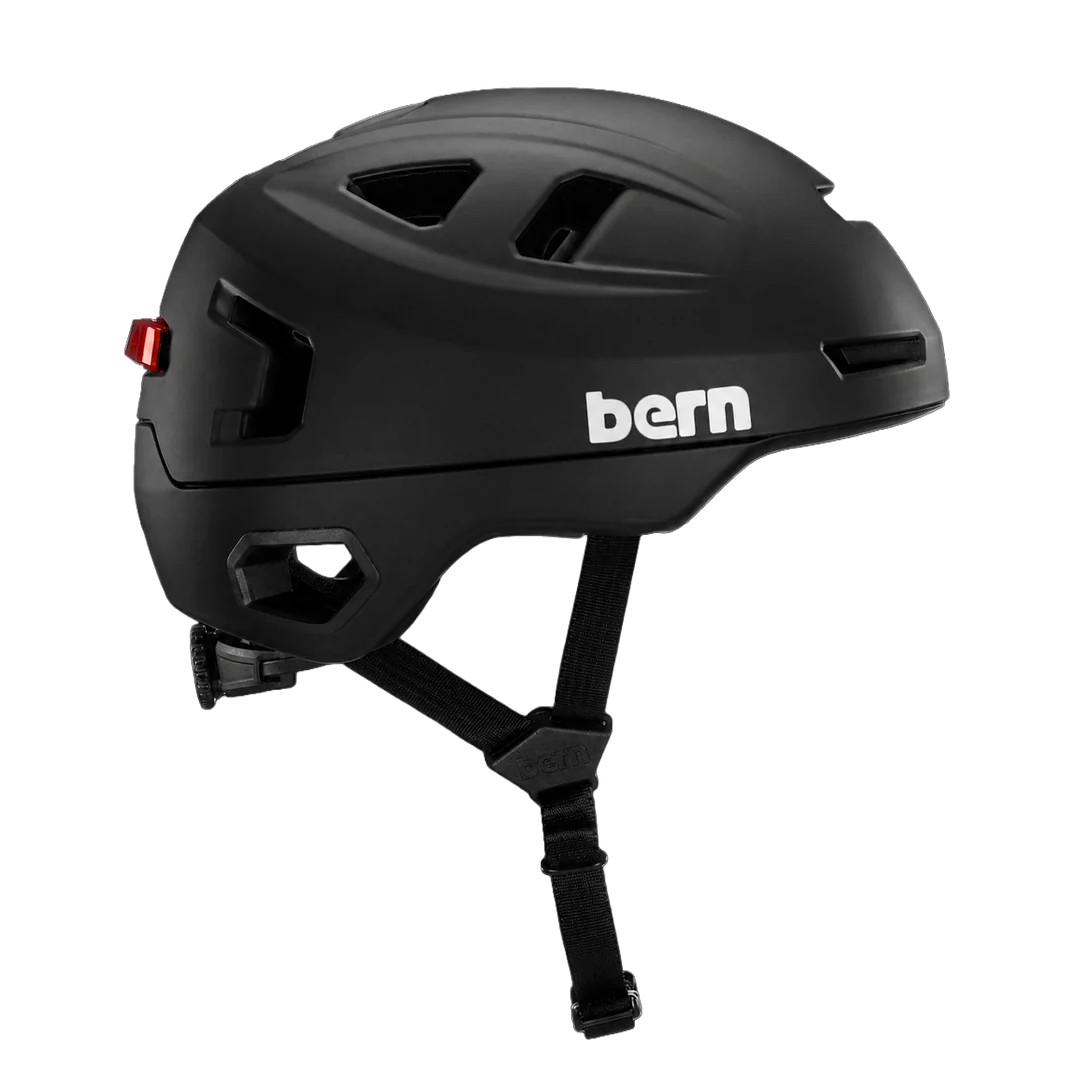 Bern Hudson MIPS bike helmet in Matte Black, front three-quarter view with visor down