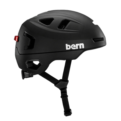 Bern Hudson MIPS bike helmet in Matte Black, front three-quarter view with visor down
