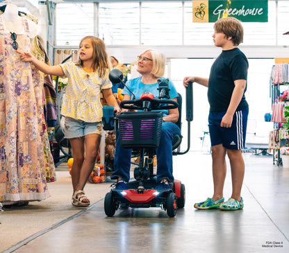 Pride Go Go Elite Traveller Gen 3 Platinum - lifestyle at garden center